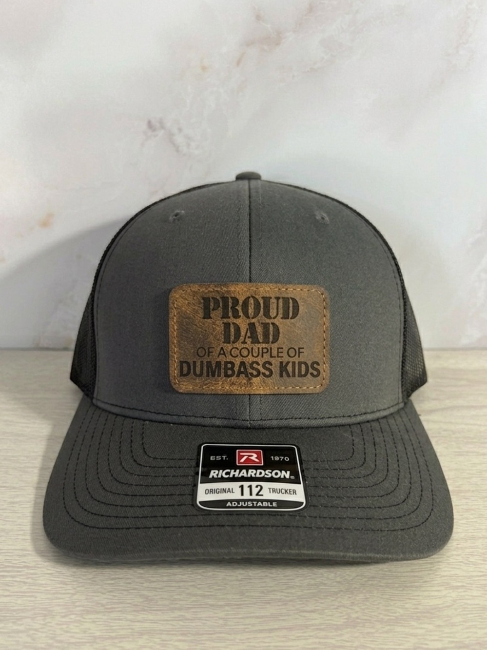 Richardson Trucker Hat with 'Proud Dad' laser engraved leather patch
